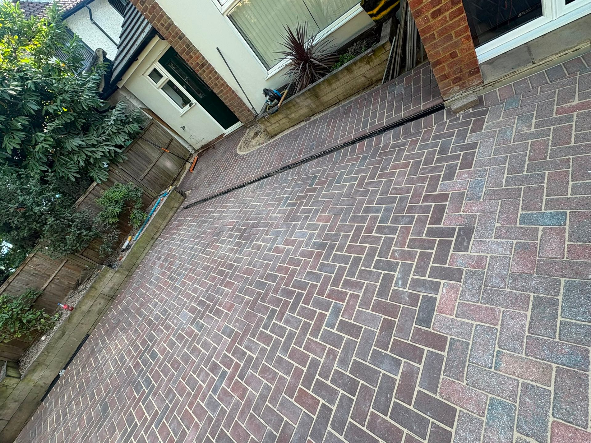 Split gravel and block paving driveway on a Hampshire terrace