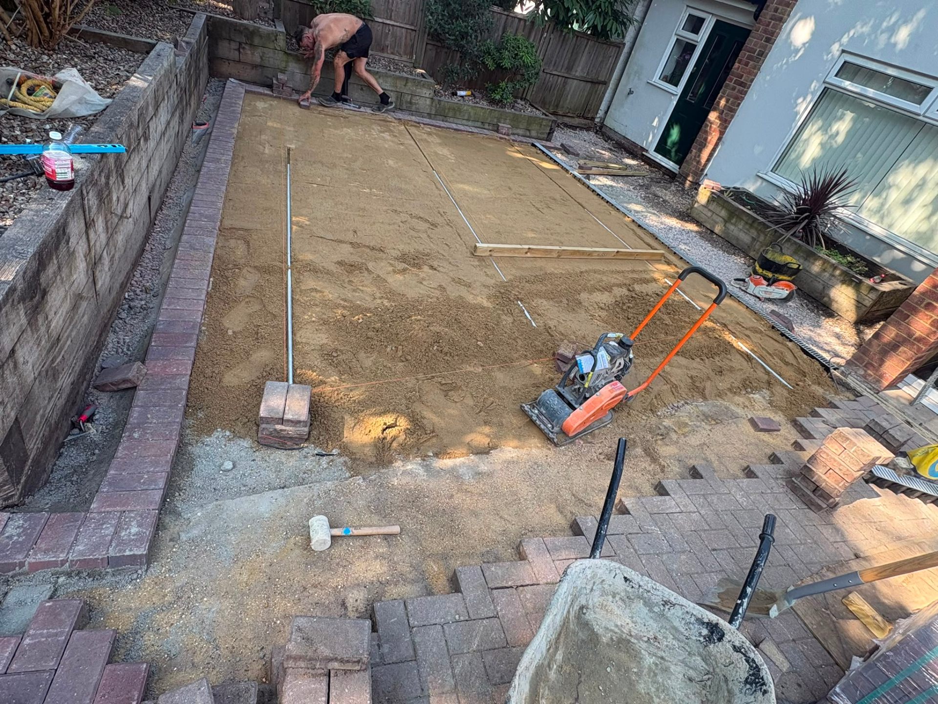 Compacted sand bed screeded ready for block paving installation