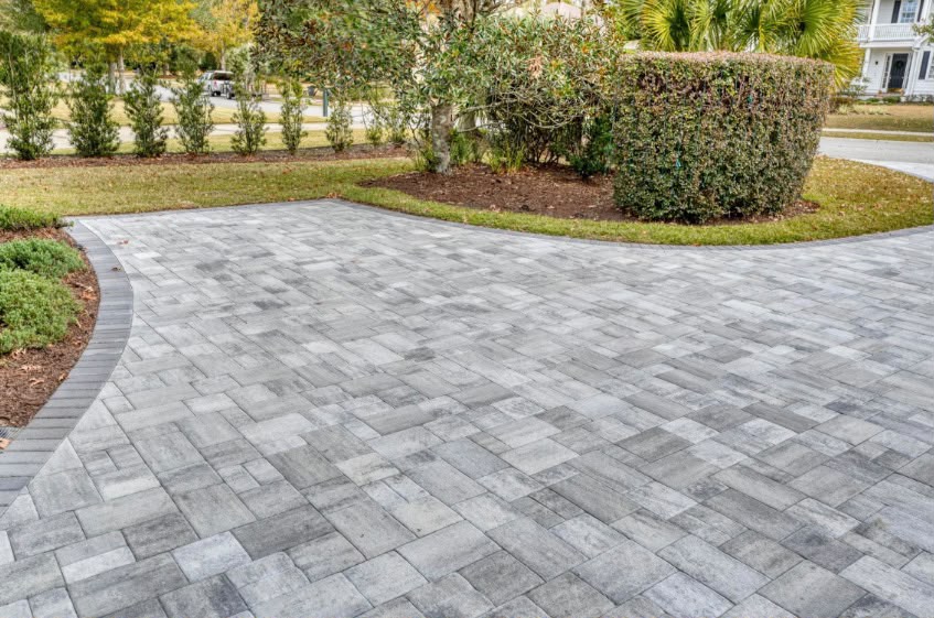 Block paving driveway with contrasting border in a residential setting